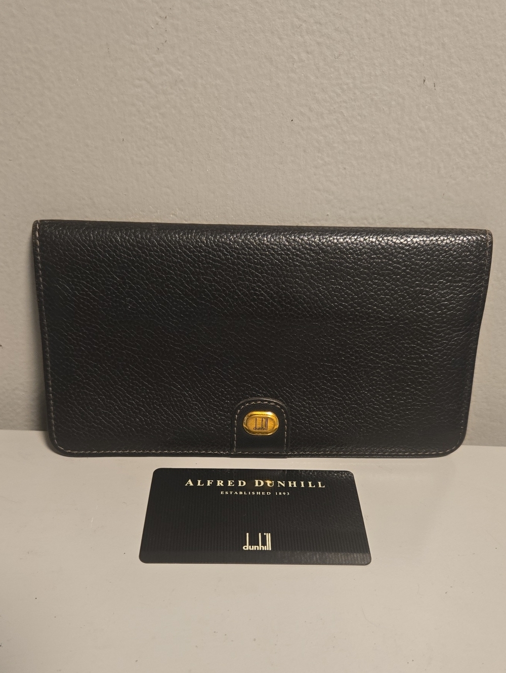 Dunhill Black Pebble Leather Continental Wallet with Gold Accent